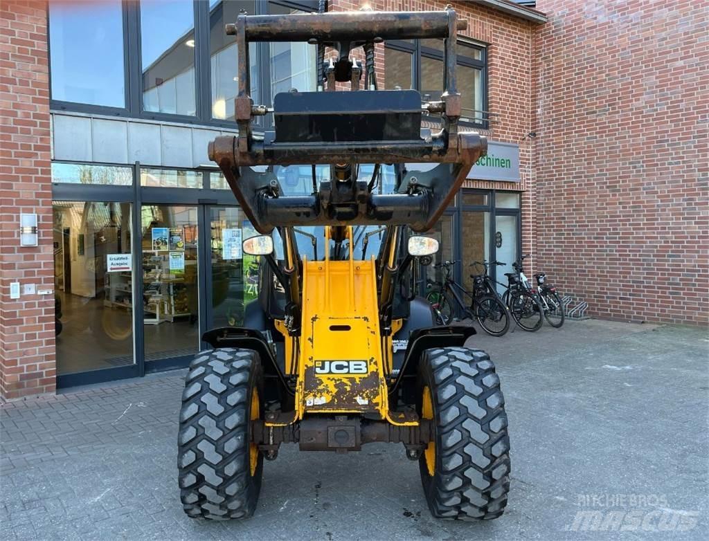 JCB 409 Kolesni nakladalci
