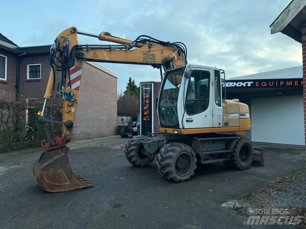 Liebherr A312 Bagri na kolesih