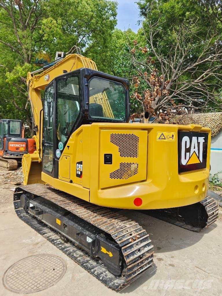 CAT 310 Bagri goseničarji