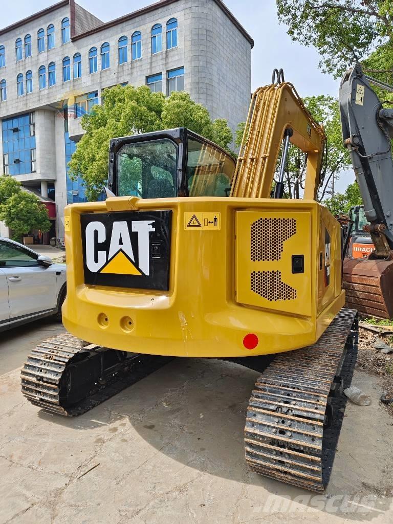 CAT 310 Bagri goseničarji