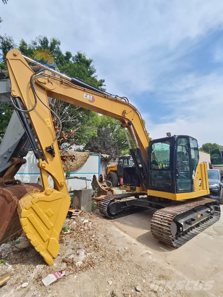 CAT 310 Bagri goseničarji