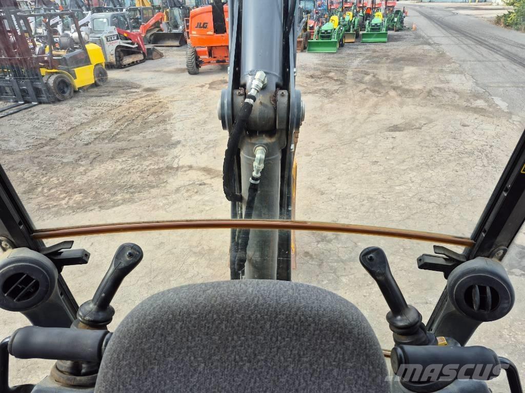 John Deere 310 Rovokopači