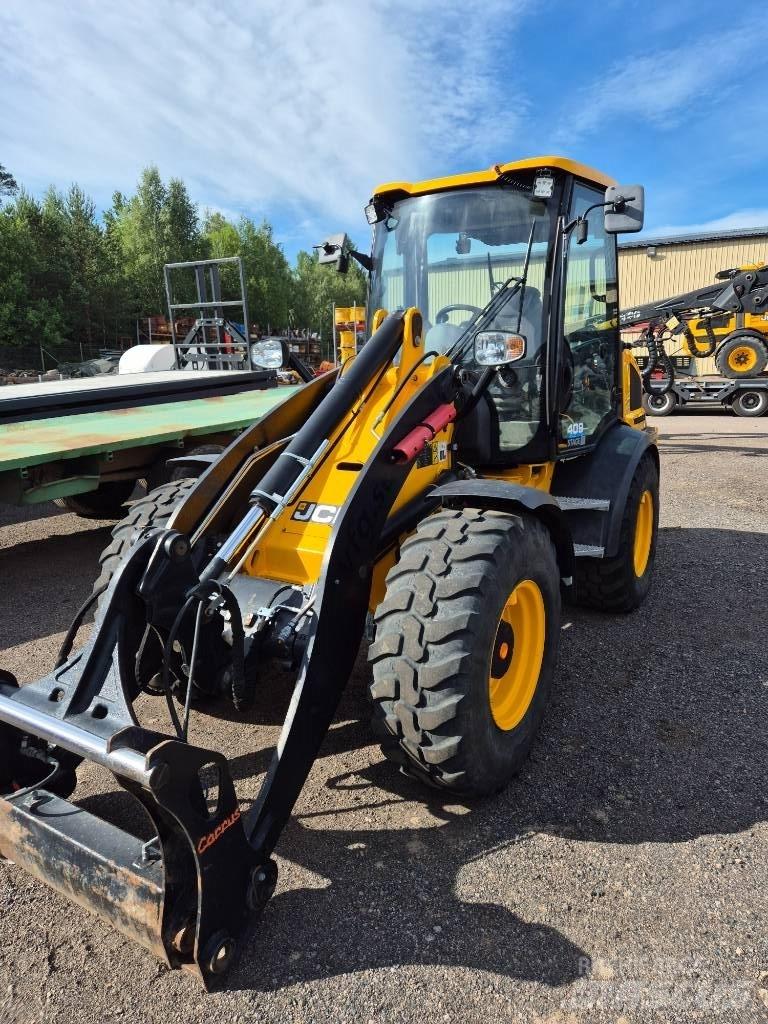 JCB 409 Kolesni nakladalci