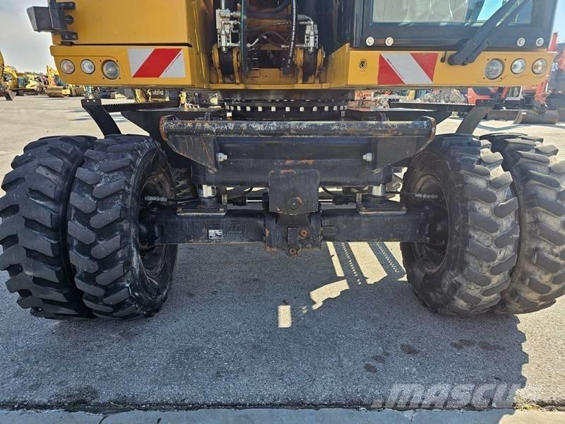 CAT M320F Bagri na kolesih