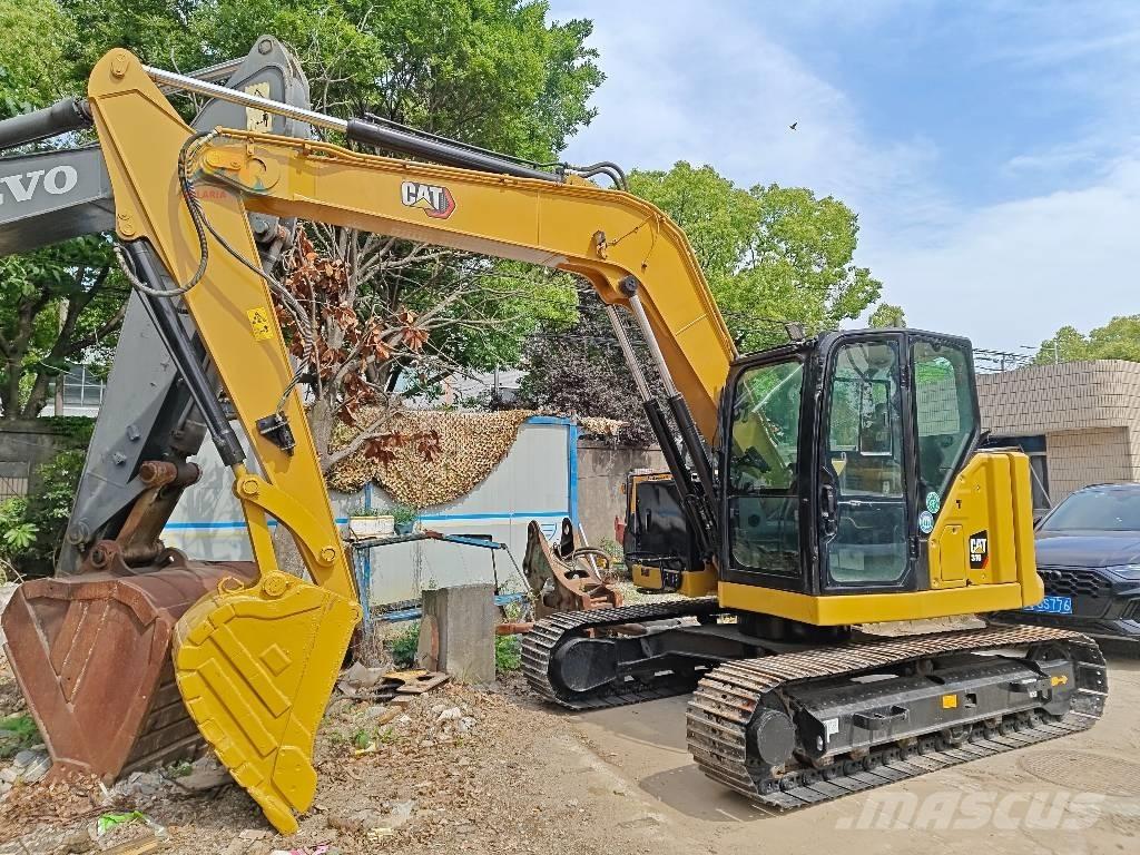 CAT 310 Bagri goseničarji