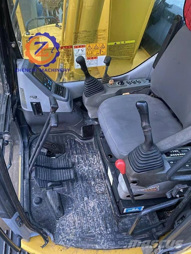 Komatsu PC 128 US Midi bagri 7t – 12t