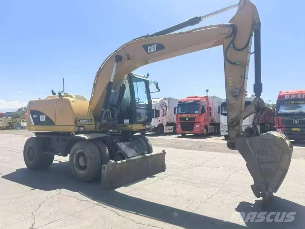 CAT M315D2 Bagri na kolesih