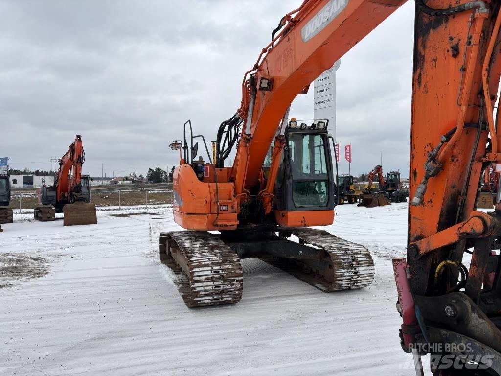Doosan DX225 LC R Bagri goseničarji