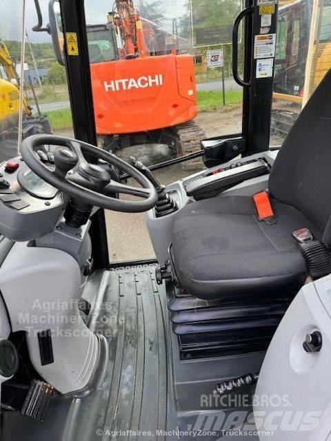 CAT 906 Kolesni nakladalci