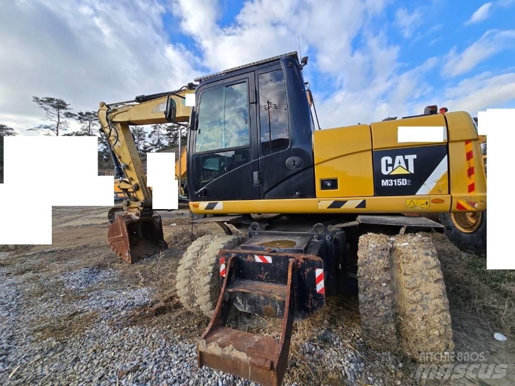 CAT M 315 D Bagri na kolesih