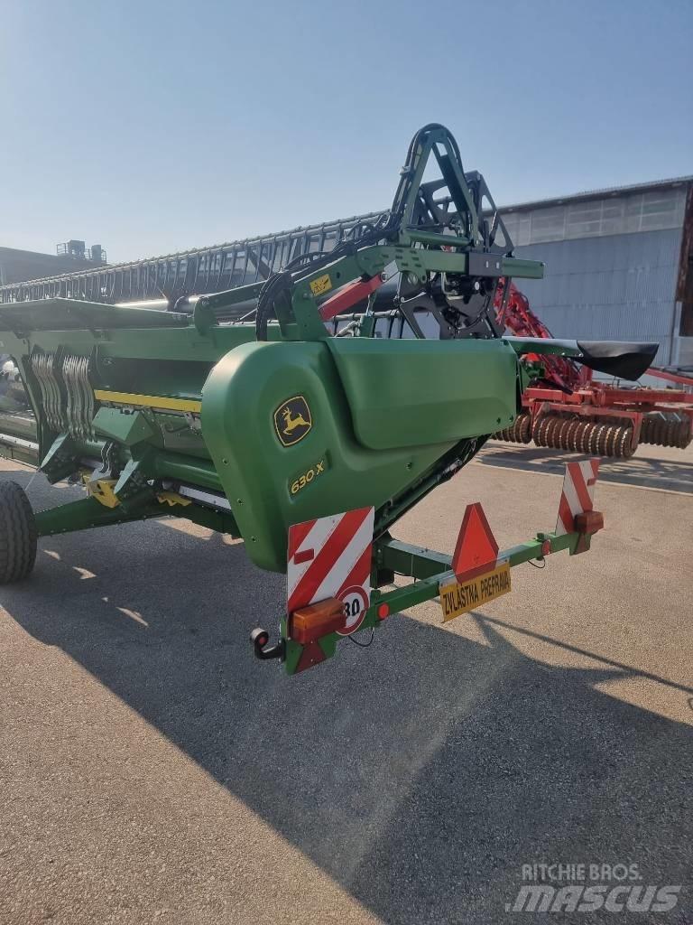 John Deere T 670 i Kombajni
