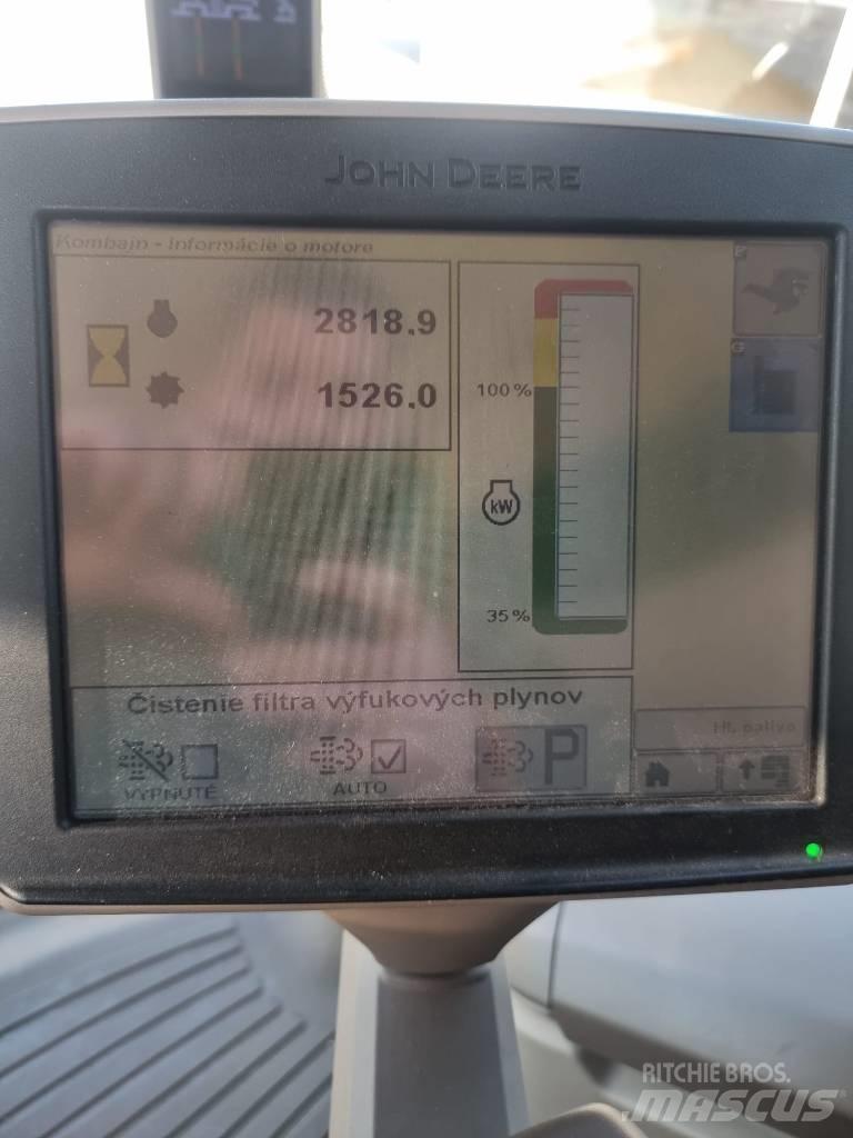 John Deere T 670 i Kombajni