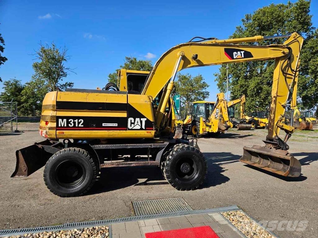 CAT M 312 Bagri na kolesih