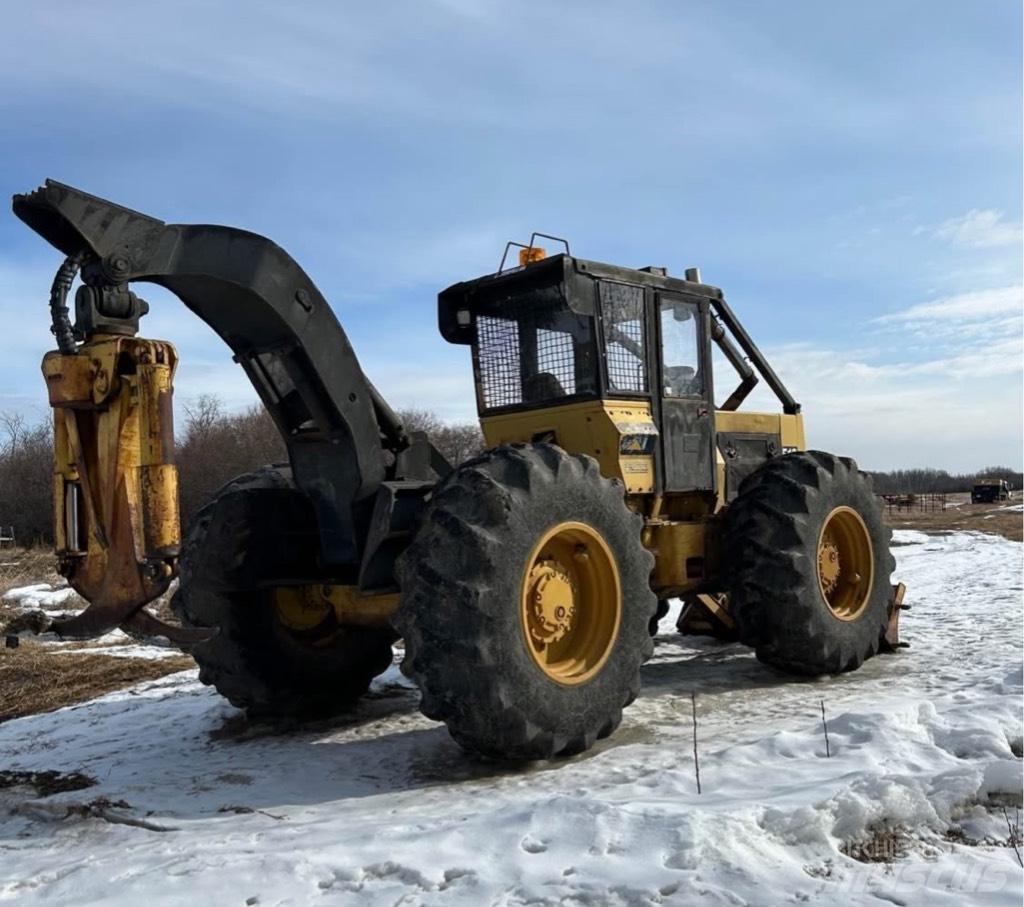 CAT 518 Skiderji