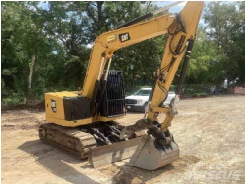 CAT 310 Bagri goseničarji