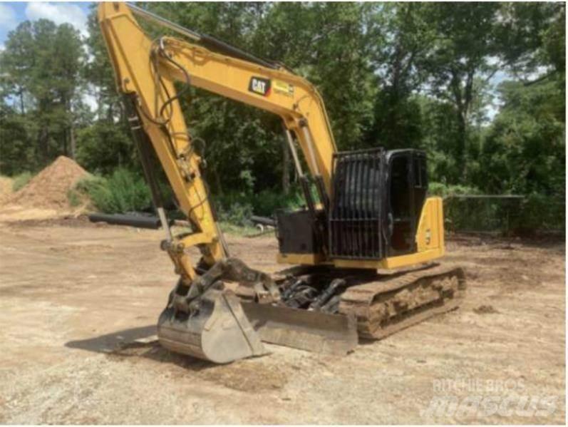 CAT 310 Bagri goseničarji