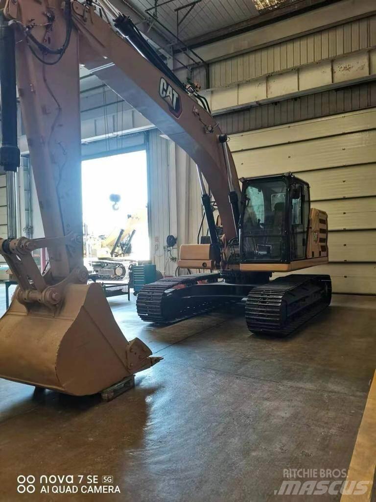 CAT 320 Bagri goseničarji