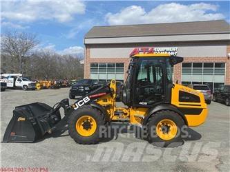JCB 409 Kolesni nakladalci