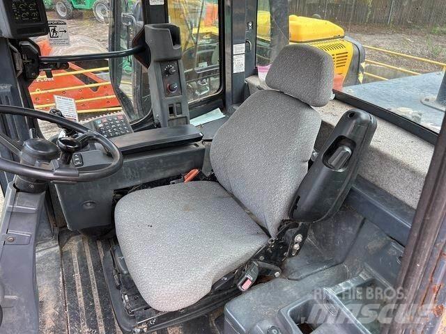 John Deere 544K Kolesni nakladalci