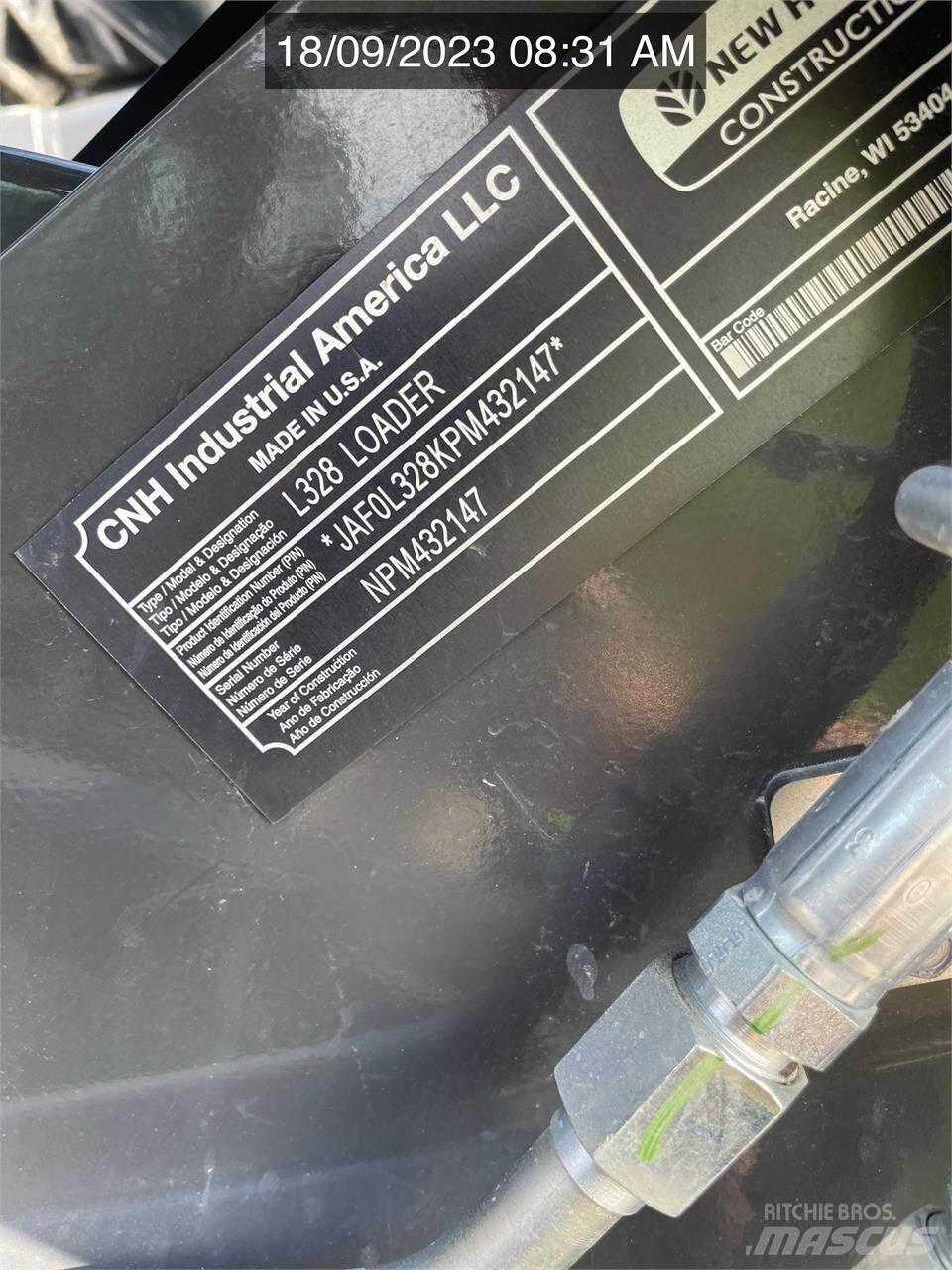 New Holland L328 Skid steer mini nakladalci