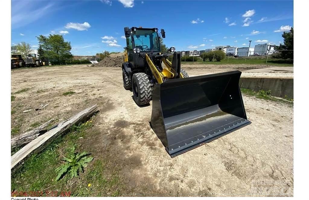 New Holland W80C Kolesni nakladalci