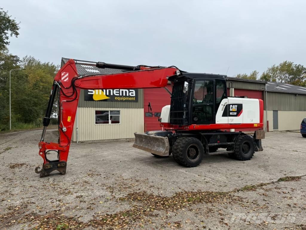 CAT M320F Bagri na kolesih