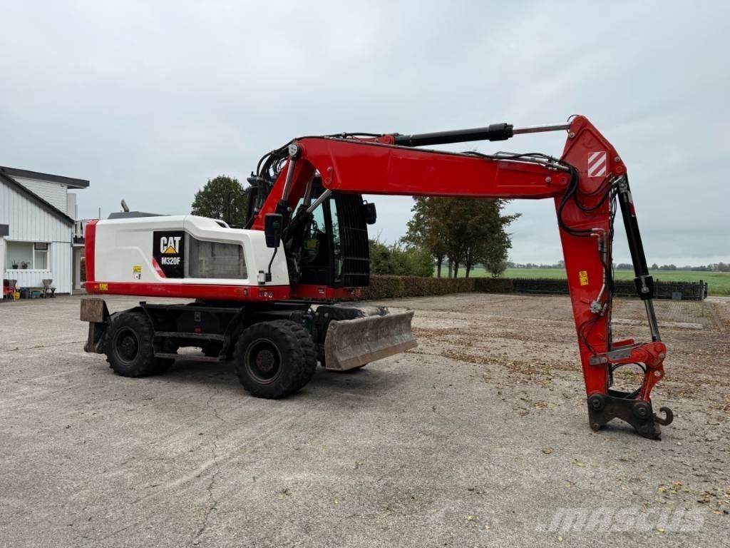 CAT M320F Bagri na kolesih