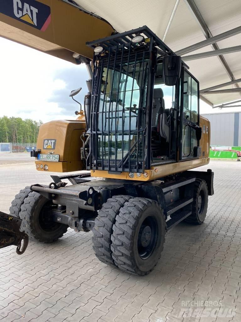 CAT M 320 F Bagri na kolesih