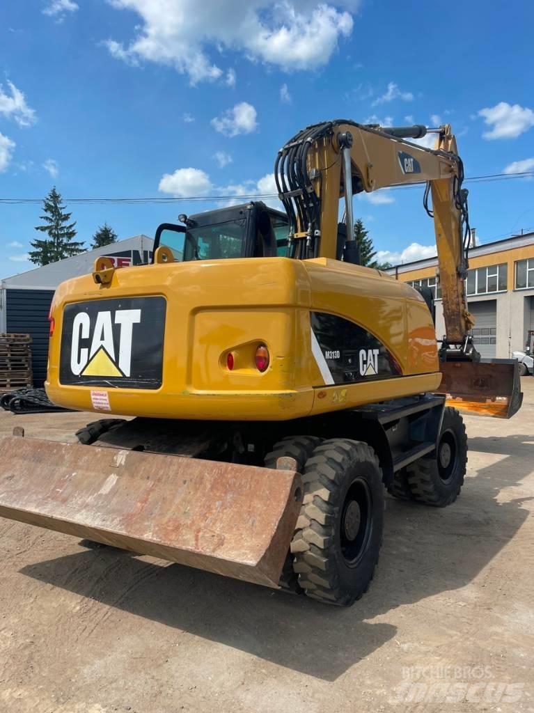 CAT M 313 D Bagri na kolesih