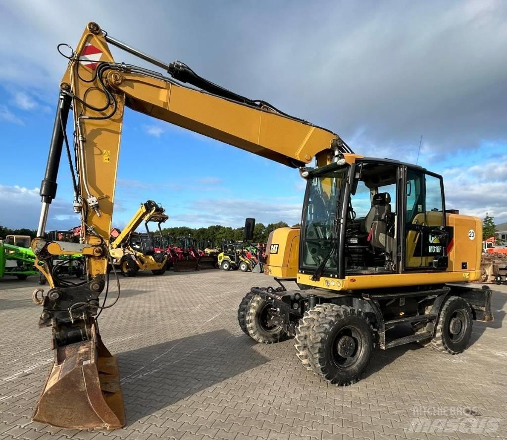 CAT M 318 F Bagri na kolesih