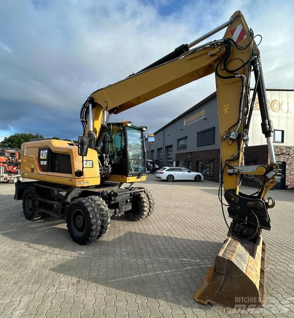 CAT M 318 F Bagri na kolesih