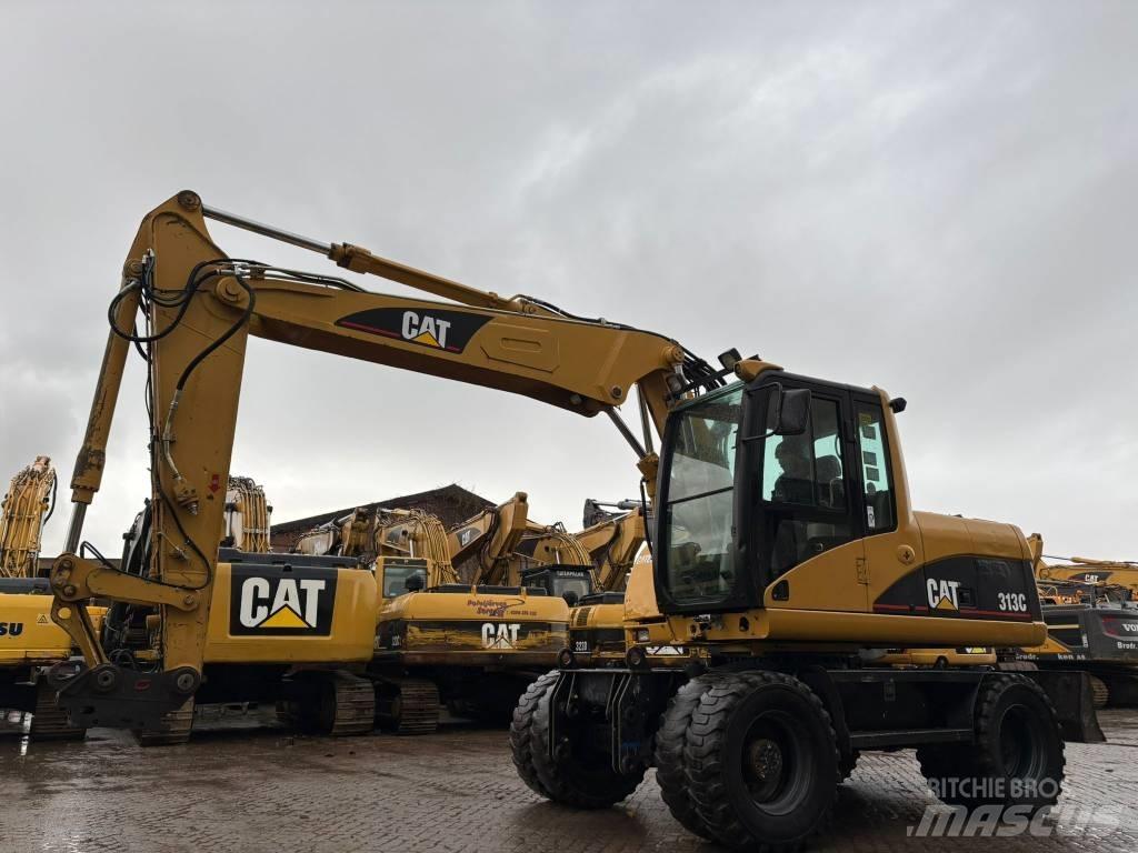 CAT M 313 C Bagri na kolesih