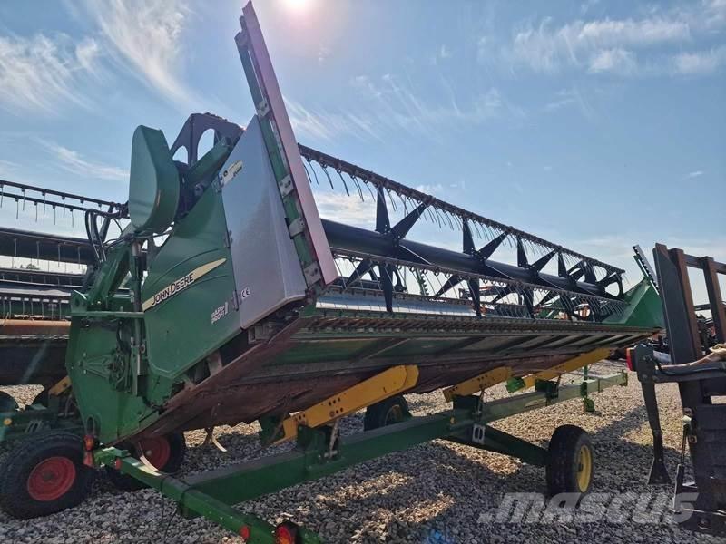 John Deere T670 Kombajni