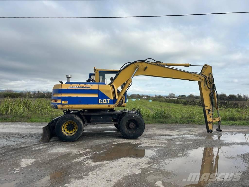 CAT M 312 Bagri na kolesih