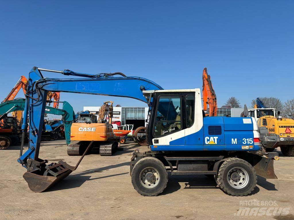 CAT M 315 Bagri na kolesih