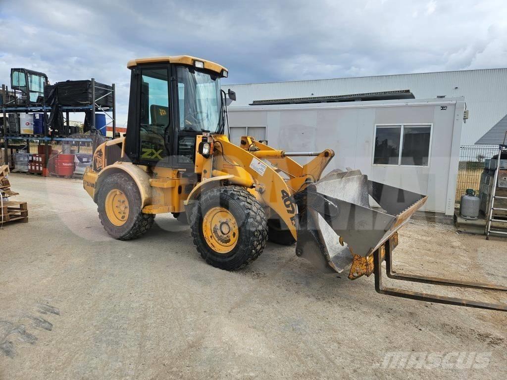 JCB 407 B Kolesni nakladalci