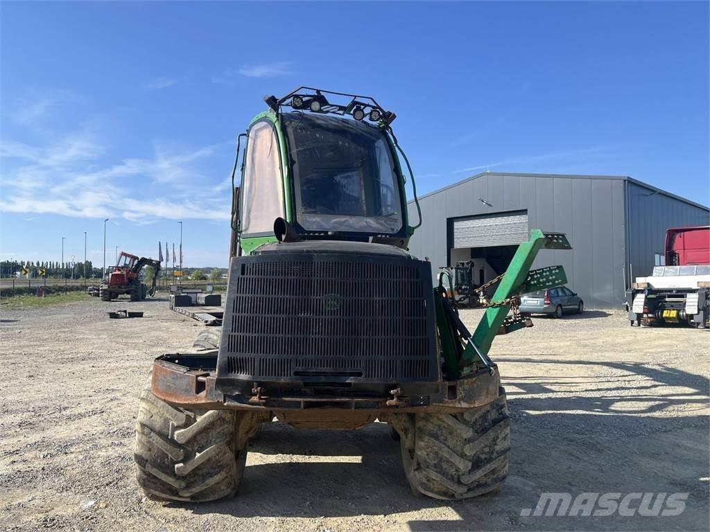 John Deere 1010E Harvesterji