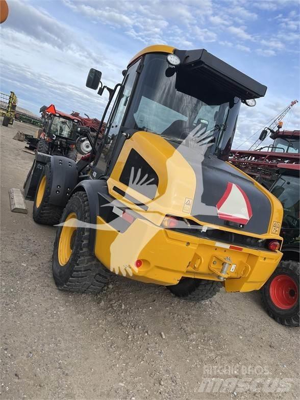 JCB 409 Kolesni nakladalci