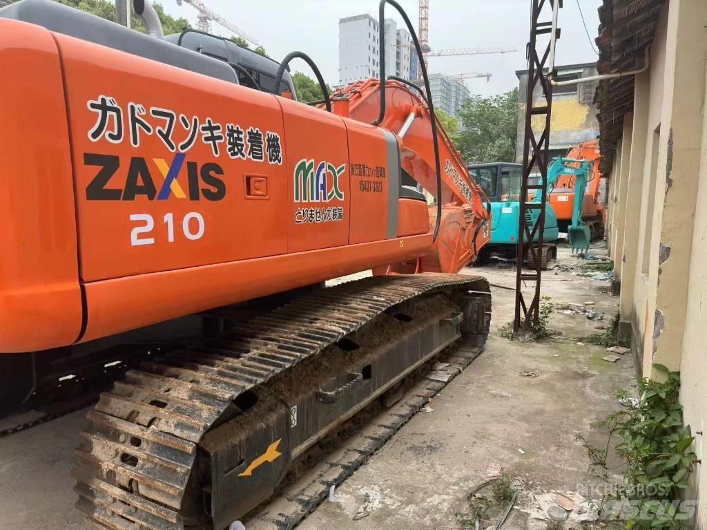 Hitachi ZX 210 Bagri goseničarji