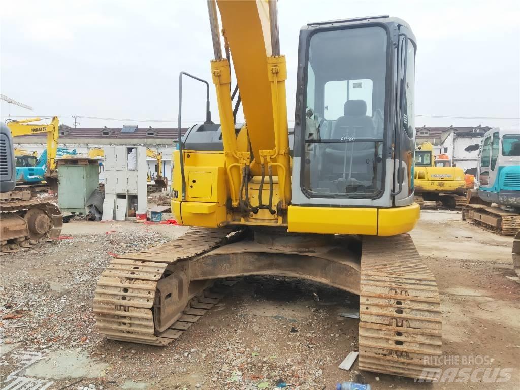 Komatsu PC 128 US Midi bagri 7t – 12t