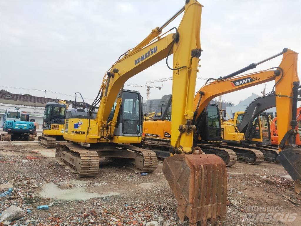 Komatsu PC 128 US Midi bagri 7t – 12t