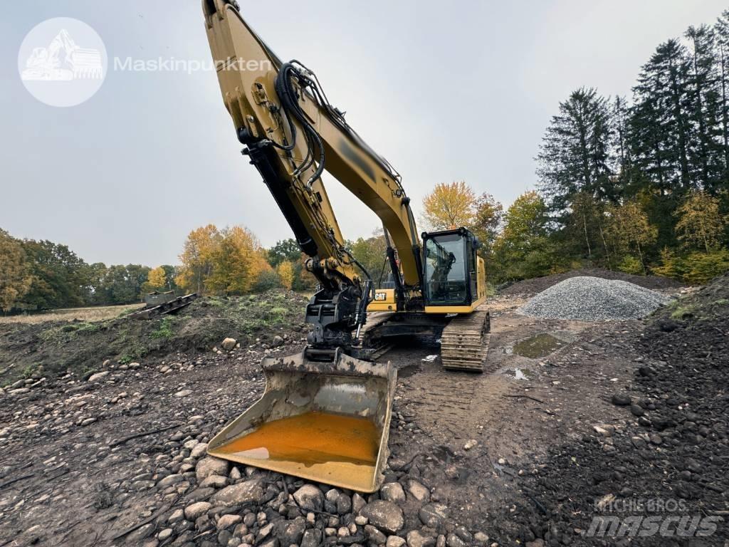 CAT 323 Bagri goseničarji