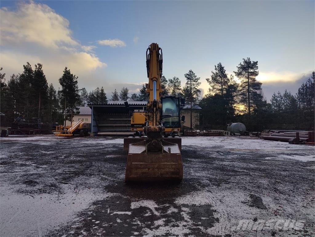 CAT M315 Bagri na kolesih