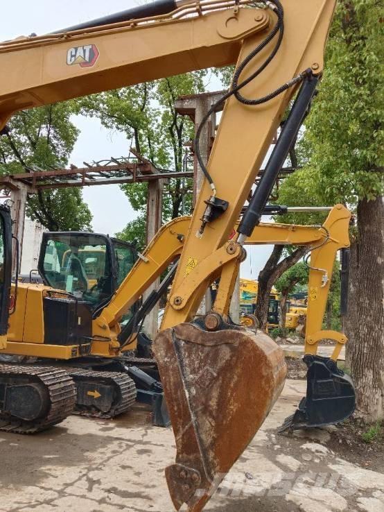 CAT 310 Bagri goseničarji