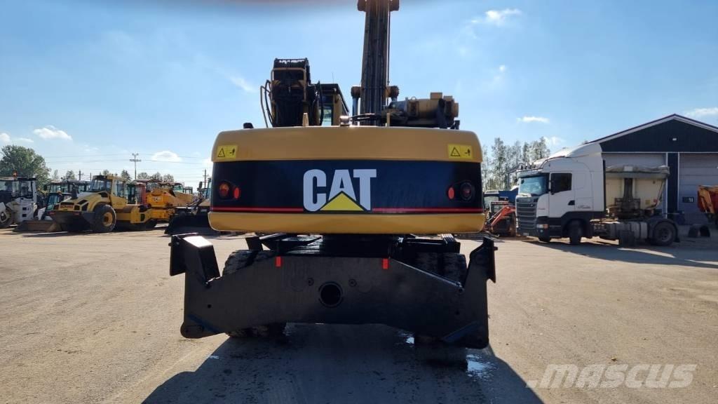 CAT M 322 C MH Bagri za prekladanje primarnih/sekundarnih surovin