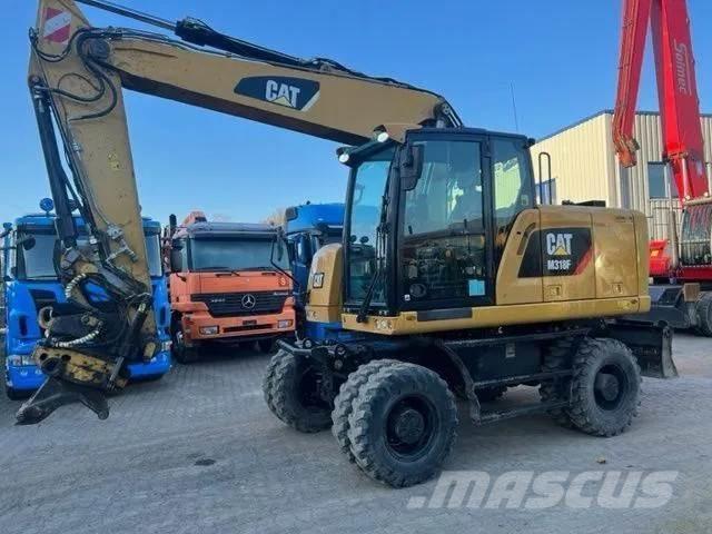 CAT M 318 F Bagri na kolesih
