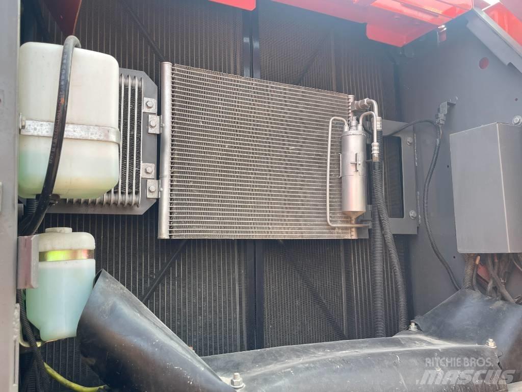 Hitachi 210LC Bagri goseničarji