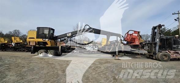 CAT 559D Nakladalci za les