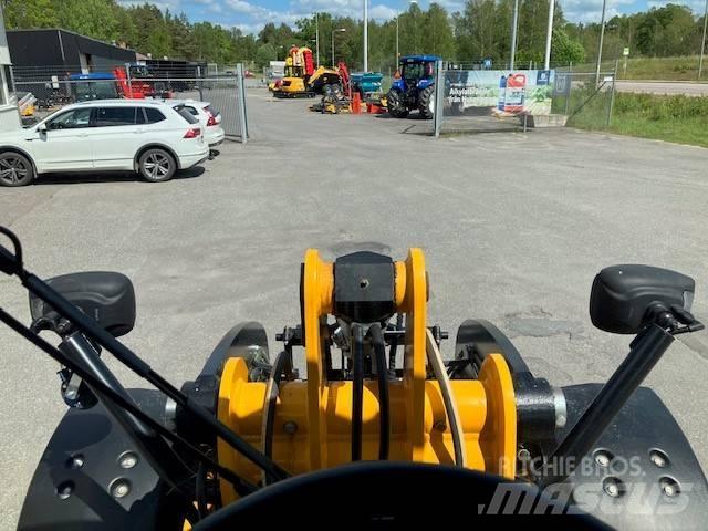 JCB 409 Kolesni nakladalci