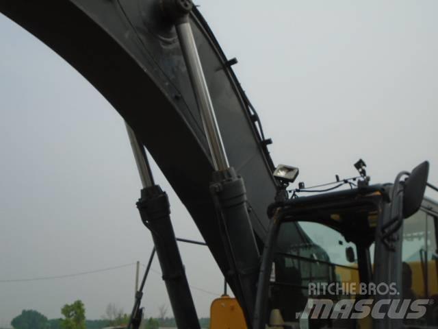John Deere 450 DLC Bagri goseničarji